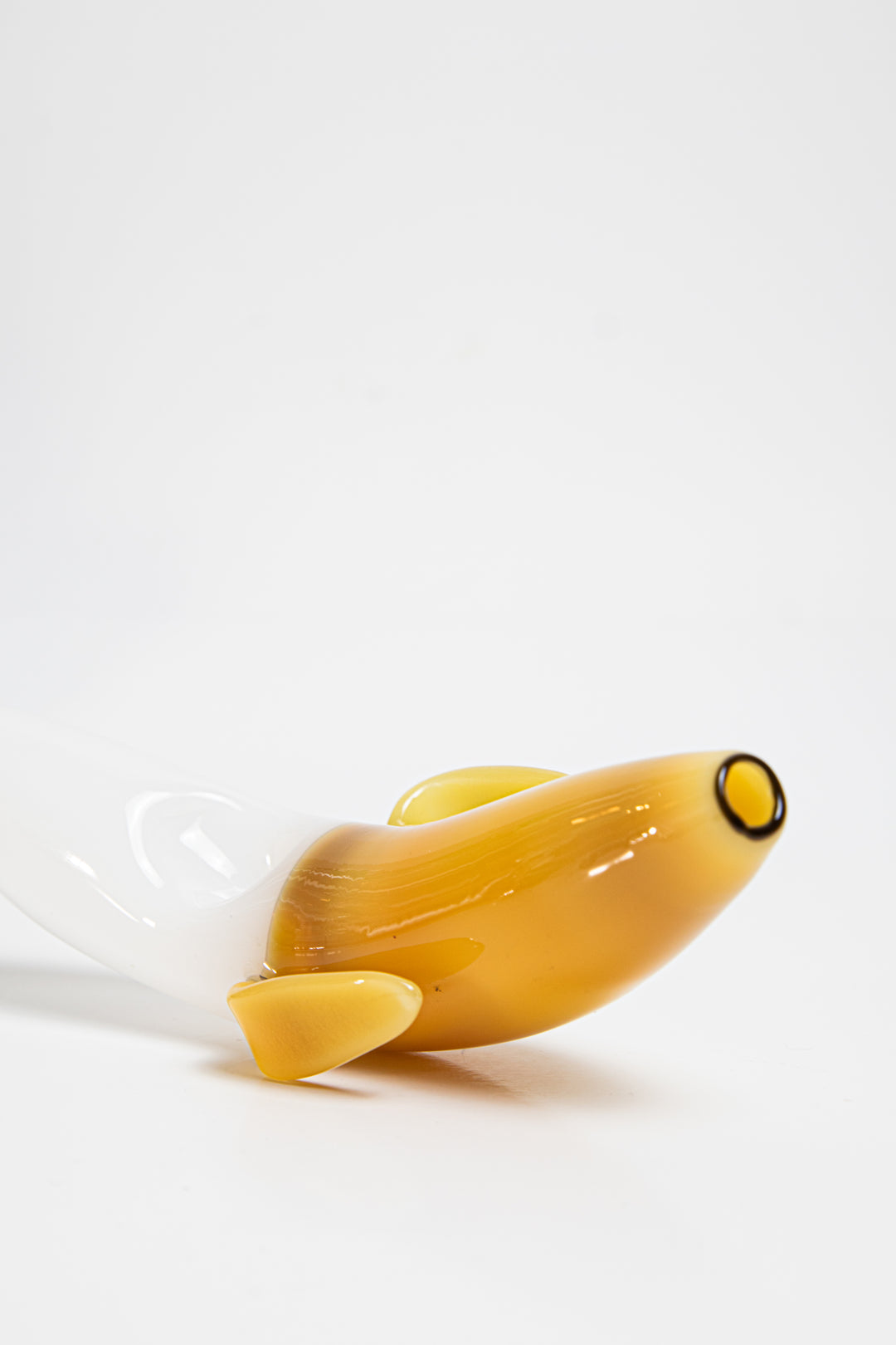 Yellow shade 3.75 inch Banana Shape Glass Pipe, perfect for dry herb/weed use. This affordable and unique piece adds a touch of whimsy to your smoking collection.