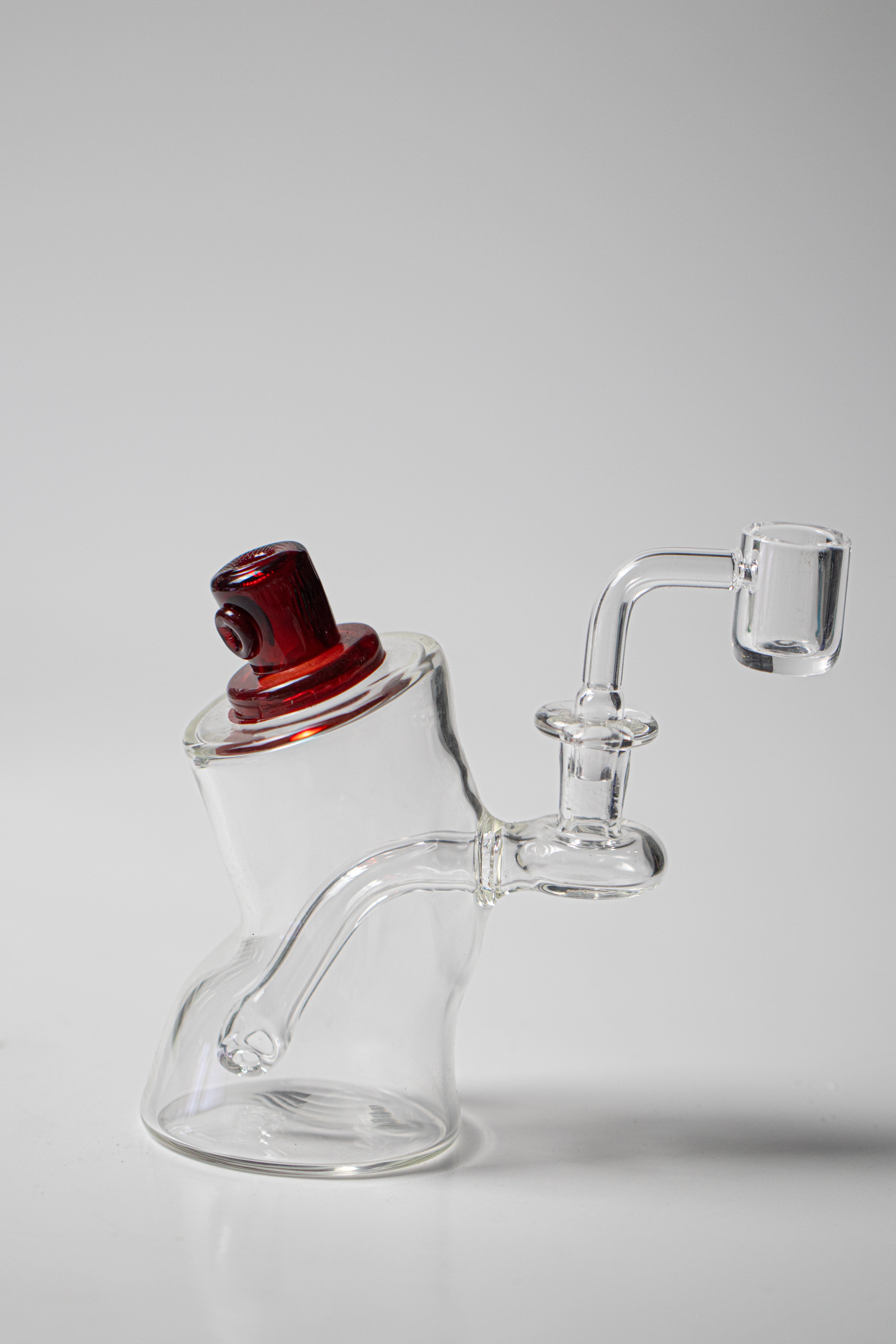 Spray Can Rigs – 5-inch water pipes handcrafted for weed and dabs. Now available for sale, these unique pieces feature a distinct Spray Can shape design, a bowl piece for weed, and a bent-down stem. Each glass blown by Skooter on IG, ensuring a smoking experience that's both creative and high-quality.