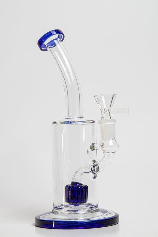 9-inch Water Rig Perc – a water pipe designed for weed and dabs. Now available for sale, this distinctive piece features a water rig shape, a 14MM male bowl piece for weed, and a tree perc bent down stem. The built-in percolator prevents water splashback, cools the smoke down, and offers extra filtration, providing a unique and refreshing twist to your smoke sessions
