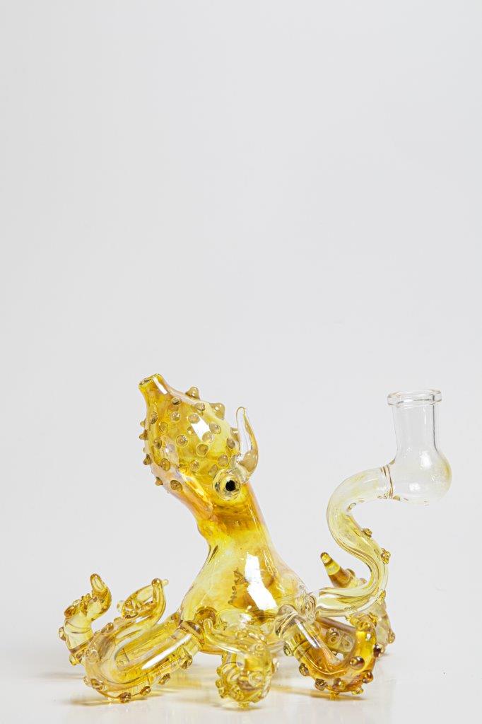 10-inch Octopus Water Pipe – a captivating rig for weed and dabs. Available for sale, this unique piece boasts an Octopus design shape, a 14MM male bowl piece for weed, and a bent down stem