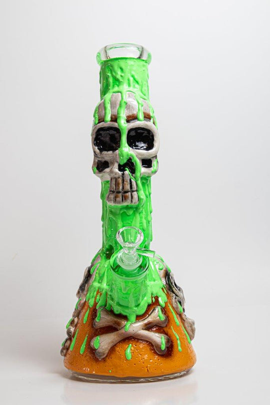 11-inch Toxic Death Beaker Bong – a captivating piece designed for weed and dabs. For sale now,  showcases a Toxic Death design, a 14MM male bowl piece for weed, and a straight down stem