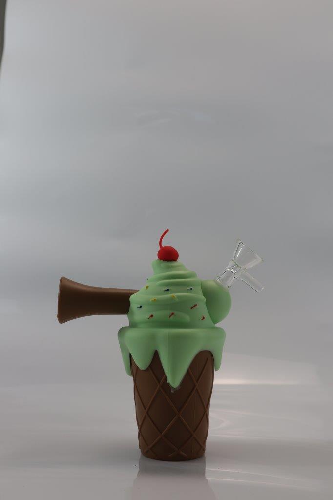 Pink/brown/green Silicone Ice Cream Cake shape steamer pipe. This unique piece includes a 14mm bowl piece, making it an ideal choice for weed enthusiasts seeking an affordable and stylish addition to their collection