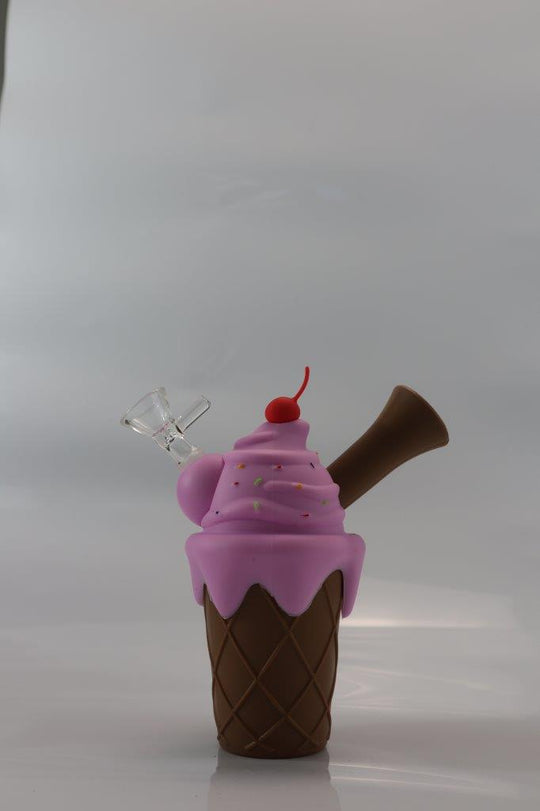 Pink/brown/green Silicone Ice Cream Cake shape steamer pipe. This unique piece includes a 14mm bowl piece, making it an ideal choice for weed enthusiasts seeking an affordable and stylish addition to their collection